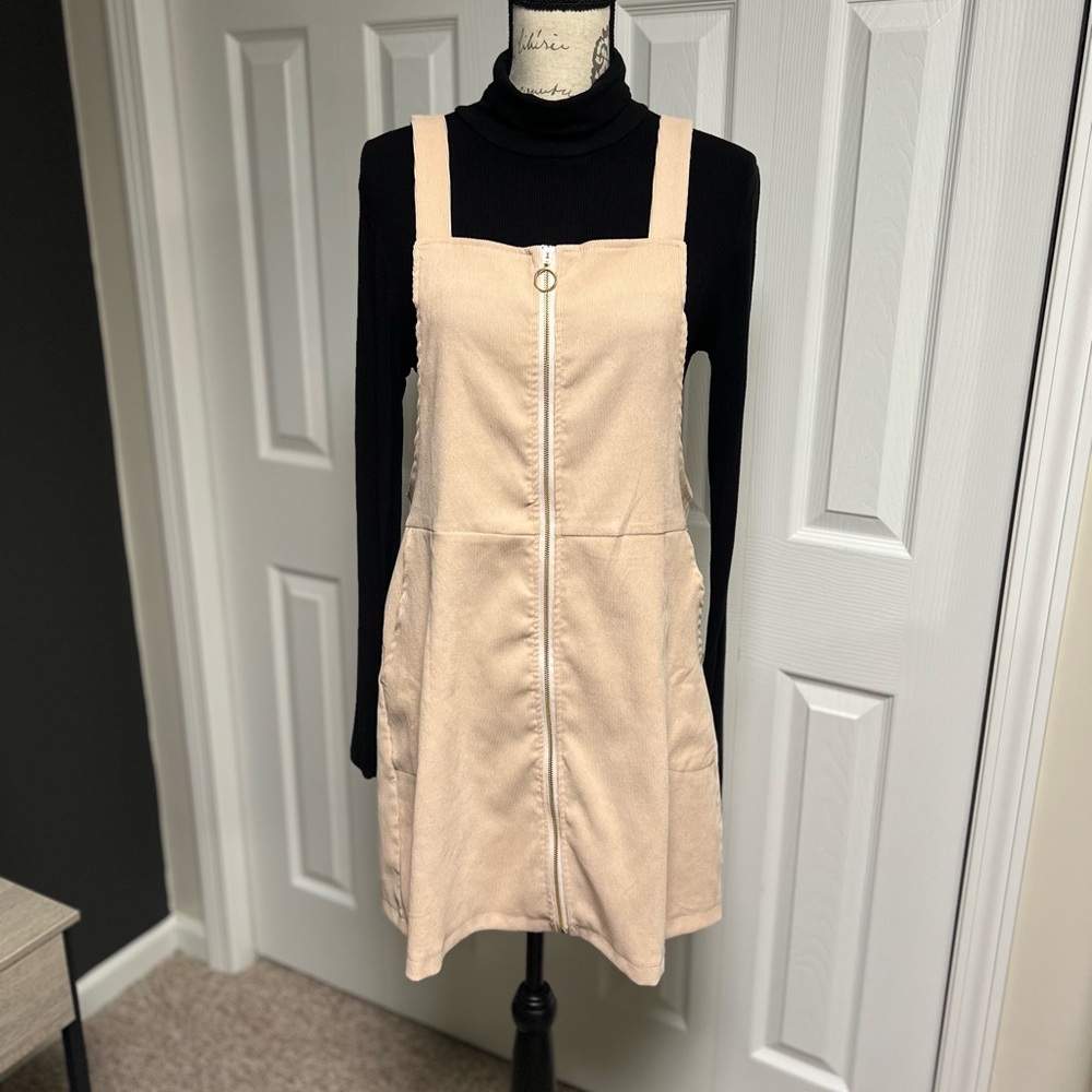 Tan corduroy dress.